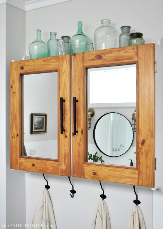 Green Glassware in Bathroom